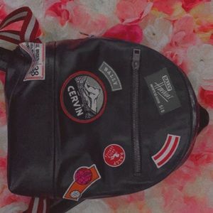 A bally designer backpack with patches !